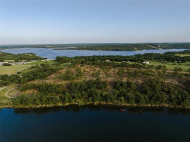With scenic views of the sky and water, Lot 9 of the Carter on Twisted Oaks Golf Club in Texas - for sale on GolfHomes.com, golf home, golf lot