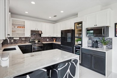 Mid-century modern influences shine throughout this true custom on Hackberry Creek Country Club in Texas - for sale on GolfHomes.com, golf home, golf lot