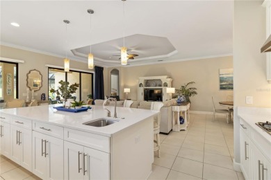 Welcome to 4540 Terrazza Court, where French Country elegance on Esplanade Golf and Country at Lakewood Ranch in Florida - for sale on GolfHomes.com, golf home, golf lot