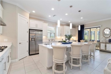 Welcome to 4540 Terrazza Court, where French Country elegance on Esplanade Golf and Country at Lakewood Ranch in Florida - for sale on GolfHomes.com, golf home, golf lot