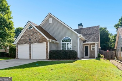Tucked into the desirable Summergrove community, this inviting on Summergrove Golf Club in Georgia - for sale on GolfHomes.com, golf home, golf lot