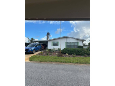 Manufactured Home on Leased Land with Lot Rent. Nestled in the on Whisperwood Golf Course in Florida - for sale on GolfHomes.com, golf home, golf lot