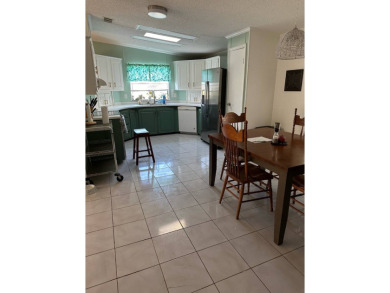 Manufactured Home on Leased Land with Lot Rent. Nestled in the on Whisperwood Golf Course in Florida - for sale on GolfHomes.com, golf home, golf lot