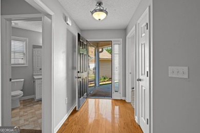 Tucked into the desirable Summergrove community, this inviting on Summergrove Golf Club in Georgia - for sale on GolfHomes.com, golf home, golf lot