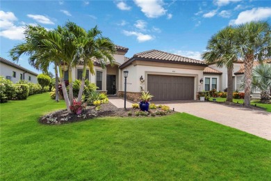 Welcome to 4540 Terrazza Court, where French Country elegance on Esplanade Golf and Country at Lakewood Ranch in Florida - for sale on GolfHomes.com, golf home, golf lot