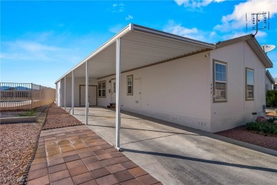 Discover this beautifully maintained manufactured home in the on Desert Greens Golf Course in Nevada - for sale on GolfHomes.com, golf home, golf lot