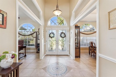 Stunning Pool Home with Golf Course & Waterfront Views!  Come on Timacuan Golf and Country Club in Florida - for sale on GolfHomes.com, golf home, golf lot