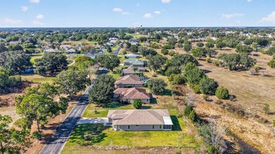 Lakes of the Lady Lake - This stunning new construction home on Lakes of Lady Lake Golf Course in Florida - for sale on GolfHomes.com, golf home, golf lot