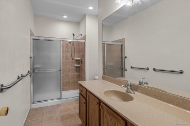 This 2 bedroom end unit ranch home is in a prime location on The Woods At Cherry Creek in New York - for sale on GolfHomes.com, golf home, golf lot