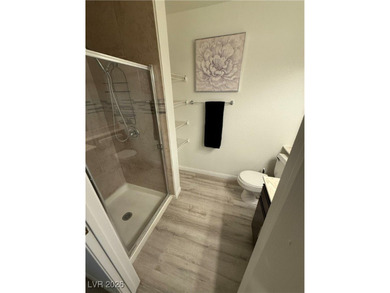 REMODELED, GUARD GATED, SECOND FLOOR CONDO WITH GORGEOUS STACKED on Canyon Gate Country Club in Nevada - for sale on GolfHomes.com, golf home, golf lot