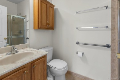 This 2 bedroom end unit ranch home is in a prime location on The Woods At Cherry Creek in New York - for sale on GolfHomes.com, golf home, golf lot