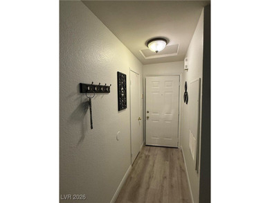 REMODELED, GUARD GATED, SECOND FLOOR CONDO WITH GORGEOUS STACKED on Canyon Gate Country Club in Nevada - for sale on GolfHomes.com, golf home, golf lot