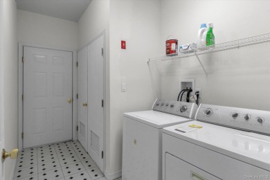This 2 bedroom end unit ranch home is in a prime location on The Woods At Cherry Creek in New York - for sale on GolfHomes.com, golf home, golf lot
