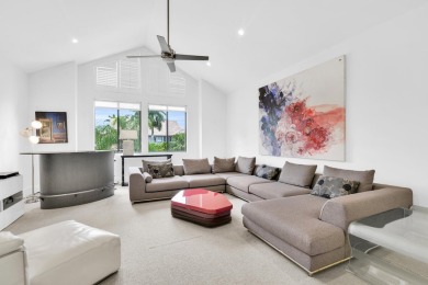 Stunning lake views are the showstopping feature of this on Boca Delray Golf and Country Club in Florida - for sale on GolfHomes.com, golf home, golf lot