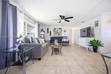 PRIDE OF OWNERSHIP SHINES THROUGHOUT THIS IMMACULATE AND on Davie Golf Club in Florida - for sale on GolfHomes.com, golf home, golf lot