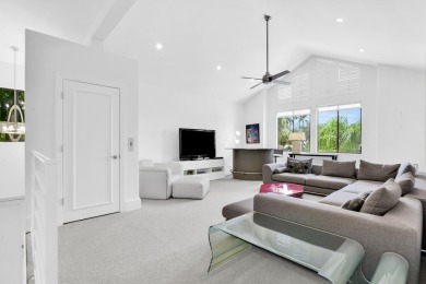 Stunning lake views are the showstopping feature of this on Boca Delray Golf and Country Club in Florida - for sale on GolfHomes.com, golf home, golf lot