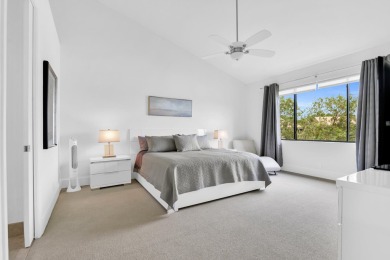 Stunning lake views are the showstopping feature of this on Boca Delray Golf and Country Club in Florida - for sale on GolfHomes.com, golf home, golf lot