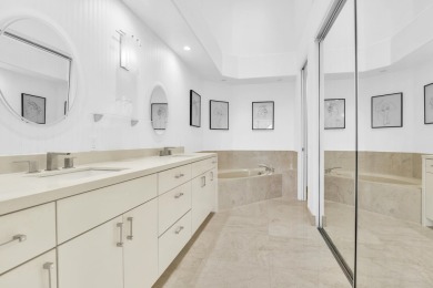 Stunning lake views are the showstopping feature of this on Boca Delray Golf and Country Club in Florida - for sale on GolfHomes.com, golf home, golf lot