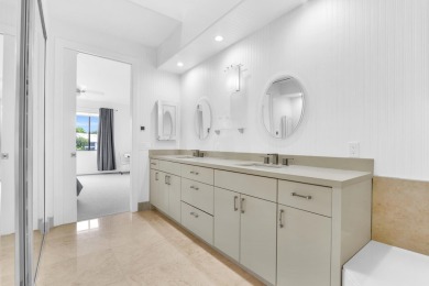 Stunning lake views are the showstopping feature of this on Boca Delray Golf and Country Club in Florida - for sale on GolfHomes.com, golf home, golf lot