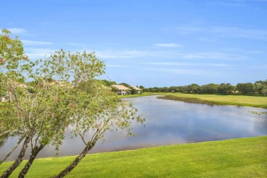 Stunning lake views are the showstopping feature of this on Boca Delray Golf and Country Club in Florida - for sale on GolfHomes.com, golf home, golf lot