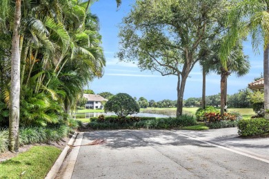 Stunning lake views are the showstopping feature of this on Boca Delray Golf and Country Club in Florida - for sale on GolfHomes.com, golf home, golf lot