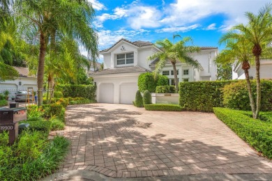 Located in an exclusive gated community, this stunning 5-bedroom on Turnberry Isle Resort and Club in Florida - for sale on GolfHomes.com, golf home, golf lot