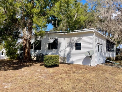 This home just listed and has 2 sheds! One has a separate on Water Oak Country Club Estates in Florida - for sale on GolfHomes.com, golf home, golf lot