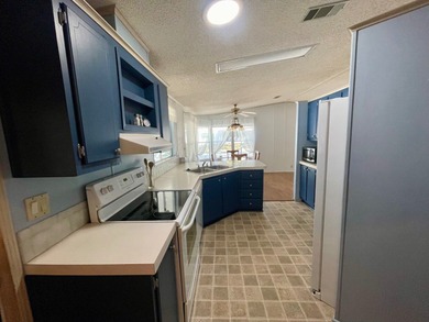 This home just listed and has 2 sheds! One has a separate on Water Oak Country Club Estates in Florida - for sale on GolfHomes.com, golf home, golf lot