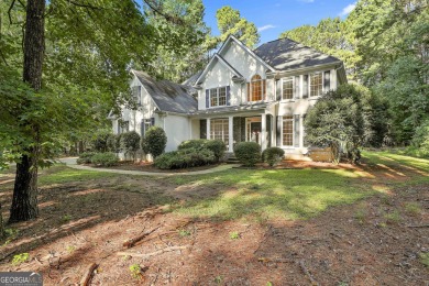 This lovely 4BR/3.5 BA Two-story home sits on a generous 1 acre on Canongate At Flat Creek Club in Georgia - for sale on GolfHomes.com, golf home, golf lot