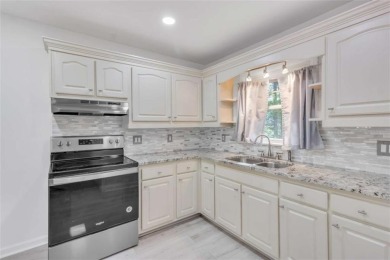 This charming 3-bedroom, 2-bath, 4-sided brick ranch in on Browns Mill Golf Course in Georgia - for sale on GolfHomes.com, golf home, golf lot