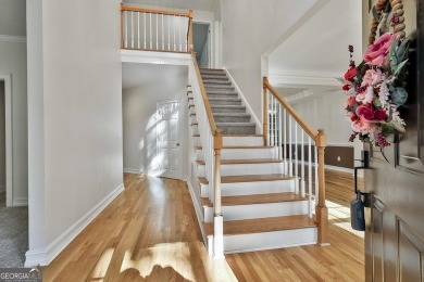 This lovely 4BR/3.5 BA Two-story home sits on a generous 1 acre on Canongate At Flat Creek Club in Georgia - for sale on GolfHomes.com, golf home, golf lot