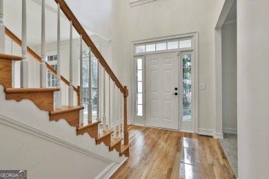 This lovely 4BR/3.5 BA Two-story home sits on a generous 1 acre on Canongate At Flat Creek Club in Georgia - for sale on GolfHomes.com, golf home, golf lot