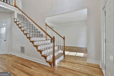 This lovely 4BR/3.5 BA Two-story home sits on a generous 1 acre on Canongate At Flat Creek Club in Georgia - for sale on GolfHomes.com, golf home, golf lot