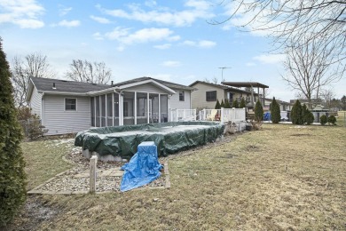 Stop looking for a home, this is it! 4 Bedroom Tri-Level home in on Lakes of the Four Seasons Country Club in Indiana - for sale on GolfHomes.com, golf home, golf lot