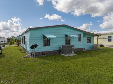 PRICED TO SELL WITH MOTIVATED SELLERS!! Charming 2-Bedroom on Six Lakes Country Club in Florida - for sale on GolfHomes.com, golf home, golf lot