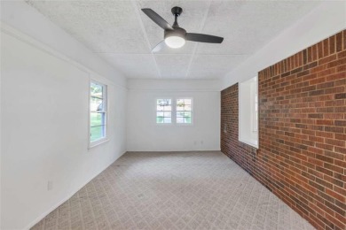 This charming 3-bedroom, 2-bath, 4-sided brick ranch in on Browns Mill Golf Course in Georgia - for sale on GolfHomes.com, golf home, golf lot