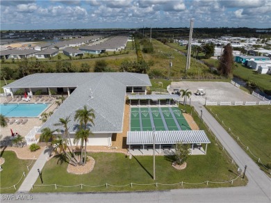 PRICED TO SELL WITH MOTIVATED SELLERS!! Charming 2-Bedroom on Six Lakes Country Club in Florida - for sale on GolfHomes.com, golf home, golf lot