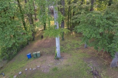 This charming 3-bedroom, 2-bath, 4-sided brick ranch in on Browns Mill Golf Course in Georgia - for sale on GolfHomes.com, golf home, golf lot