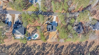 Welcome to this breathtaking luxury 3-bedroom, 3-bathroom room on Fairfield Plantation Golf and Country Club in Georgia - for sale on GolfHomes.com, golf home, golf lot