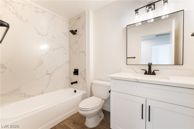 Enjoy golf course views from the patio of this move-in ready on Highland Falls Golf Club in Nevada - for sale on GolfHomes.com, golf home, golf lot