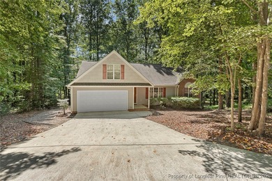 DOUBLE LOT FOR PRIVACY! Beautiful 3-bedroom, 2-bath home with a on Carolina Trace Country Club in North Carolina - for sale on GolfHomes.com, golf home, golf lot