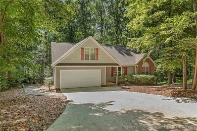 DOUBLE LOT FOR PRIVACY! Beautiful 3-bedroom, 2-bath home with a on Carolina Trace Country Club in North Carolina - for sale on GolfHomes.com, golf home, golf lot