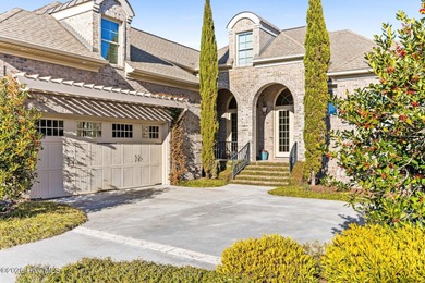 Some homes capture water views. This one lives in them. Custom on Ocean Ridge Plantation in North Carolina - for sale on GolfHomes.com, golf home, golf lot