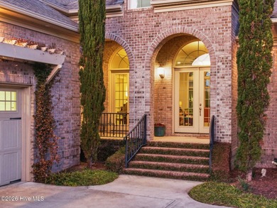 Some homes capture water views. This one lives in them. Custom on Ocean Ridge Plantation in North Carolina - for sale on GolfHomes.com, golf home, golf lot