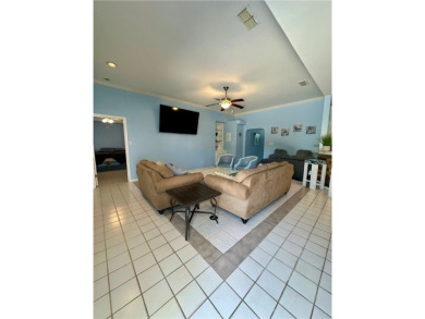 Welcome to 14114 La Blanquilla Drive located in the desirable on Padre Isles Golf Course in Texas - for sale on GolfHomes.com, golf home, golf lot