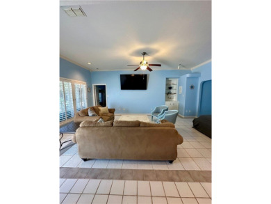 Welcome to 14114 La Blanquilla Drive located in the desirable on Padre Isles Golf Course in Texas - for sale on GolfHomes.com, golf home, golf lot