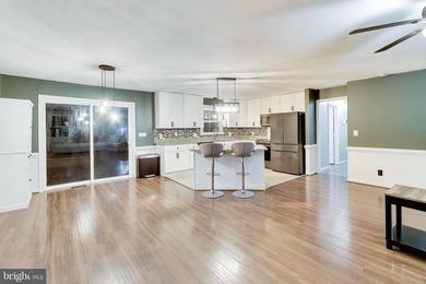 Bright and open one-level living in the fabulous gated community on Aquia Harbour Golf and Country Club in Virginia - for sale on GolfHomes.com, golf home, golf lot