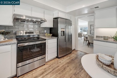 The minute you enter this charming home you are embraced by an on Rossmoor Golf Course in California - for sale on GolfHomes.com, golf home, golf lot