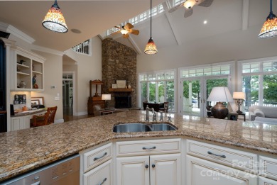 Welcome to this truly spectacular lakefront dream home in the on Old North State Club at Uwharrie Point Golf community in North Carolina - for sale on GolfHomes.com, golf home, golf lot