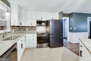 Bright and open one-level living in the fabulous gated community on Aquia Harbour Golf and Country Club in Virginia - for sale on GolfHomes.com, golf home, golf lot